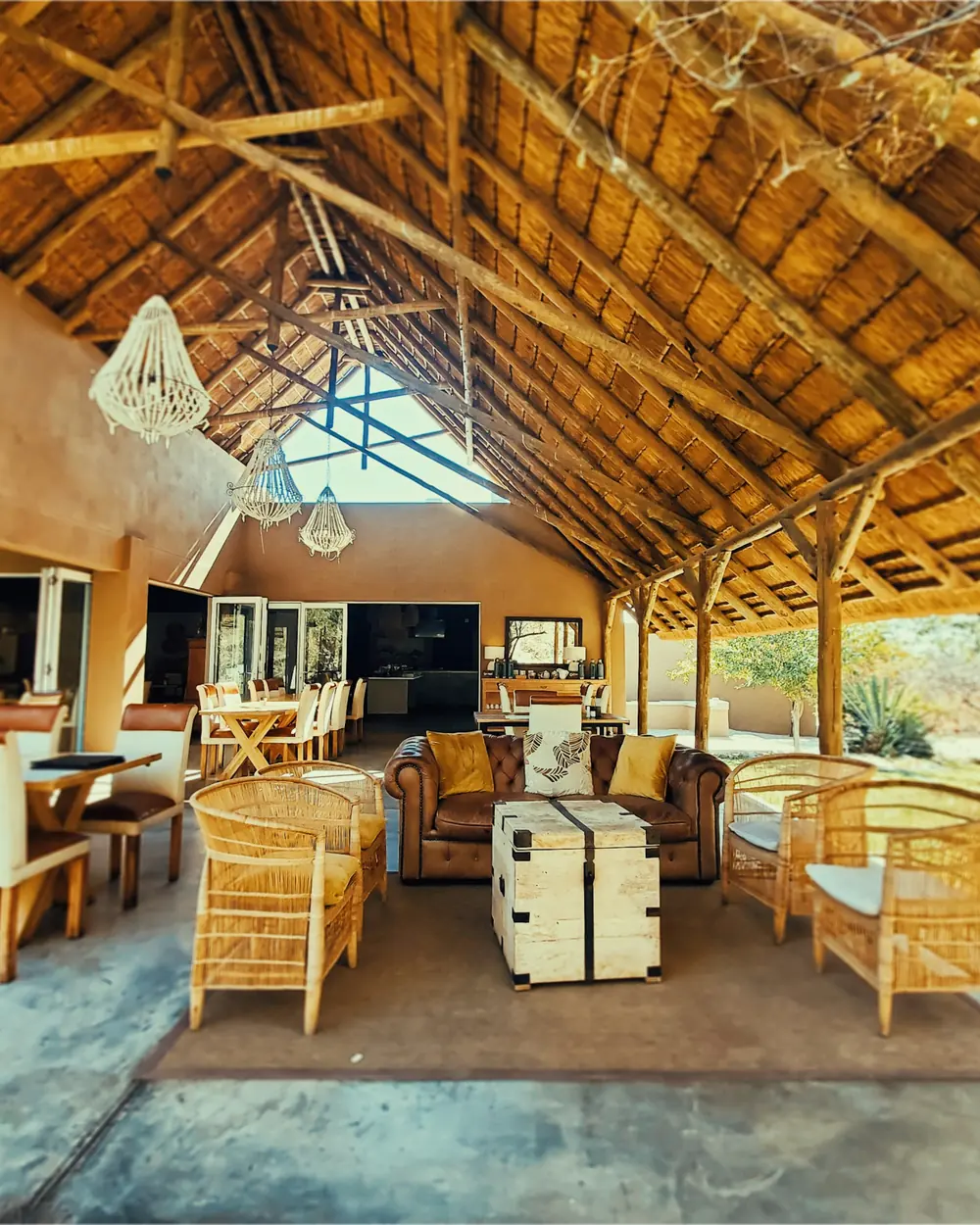 A thatched lounge in a safari camp